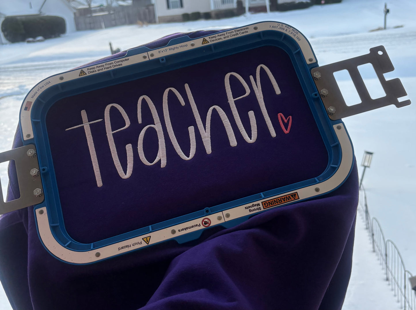 Purple embroidered Teacher Sweatshirt with a pink heart